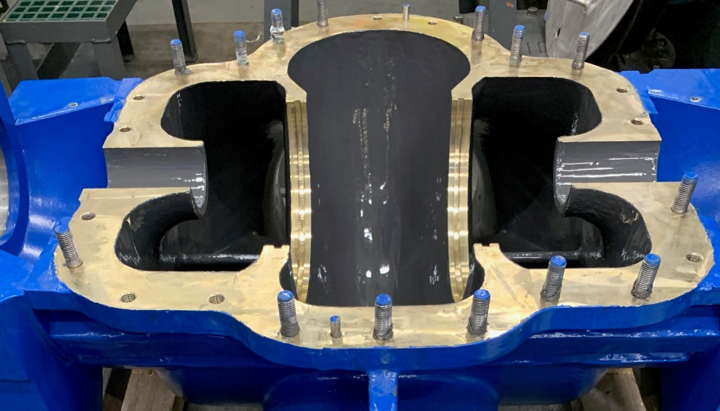 machinery, engine block, blue housing, bolt studs, bronze gasket